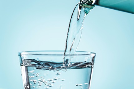Pouring Water Into a Glass